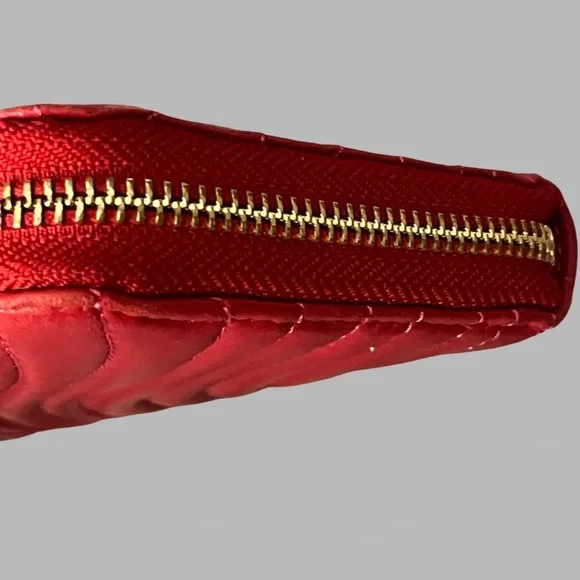 Henri Bendel red quilted wallet with a gold-tone logo. - Picture 6 of 16